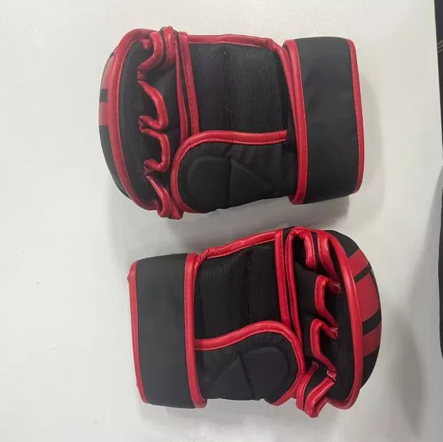 MMA gloves showing flexible finger movement for grappling techniques